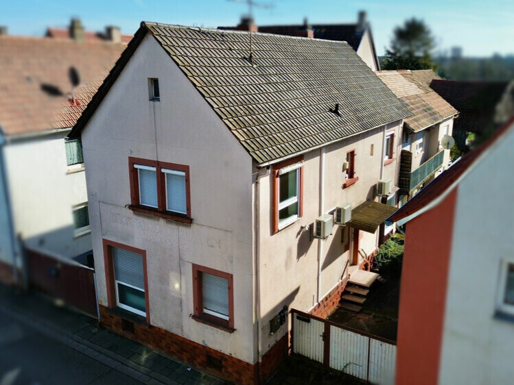 Kapitalanlage mit Potenzial: vielseitiges MFH mit drei Wohneinheiten in Herxheim-A1263952